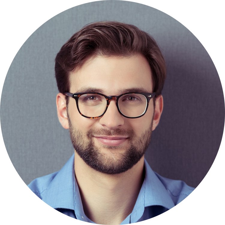 Smiling man wearing glasses with a beard