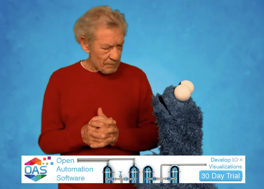 Man in red shirt with the Cookie Monster